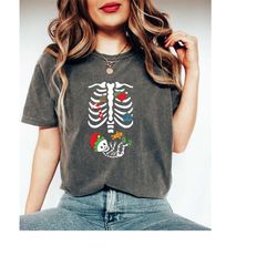 comfort colors, christmas pregnant skeleton shirt, xmas baby shirt, pregnancy announcement shirt, baby reveal shirt, mat