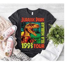 jurassic park isla nublar 1993 tour poster graphic shirt, jurassic world dinosaur t-rex shirt, magic kingdom, disneyland