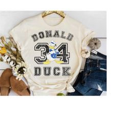 disney mickey and friends donald duck 34 t-shirt, mickey and friends tee, disney birthday party tee, disneyland trip fam