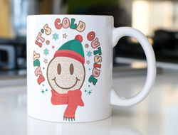 retro christmas coffee mug stating  baby its cold outside  with smiley face