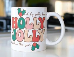 retro christmas coffee mug stating  oh by golly have a holly jolly christmas this year