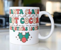 retro christmas vibes coffee mug stating  santa claus reindeer hot cocoa holiday movies christmas lights