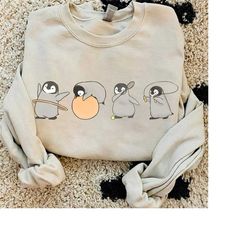 cute funny penguins doing sports vintage shirt, penguin lover penguin awareness day, unisex t-shirt family birthday gift