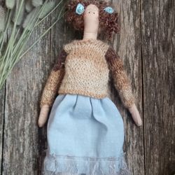 handmade tilda doll in rustic style in soft colors