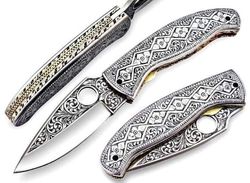 engraved folding knive blade
