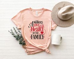 a mother's love is the heart of the family shirt png,funny mom shirt png, mother's day shirt png,mama shirt png,mother's