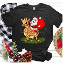 santa riding giraffe christmas pajama gifts xmas t shirt, giraffe sweater, giraffe sweatshirt, funny giraffe, cute giraf