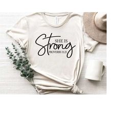 she is strong svg - bible verse scripture svg shirt design for christian, church, choir member, women - proverbs 31:25 -