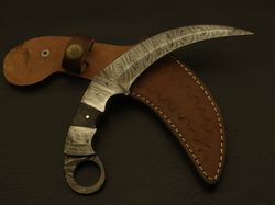 beautiful handmade damascus steel knife handle made of camel bone