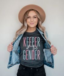 keeper of the gender shirt png , gender reveal party shirt pngs, team boy team girl baby announcement shirt pngs gender