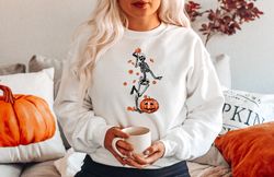 halloween party dancing skeleton sweatshirt png, halloween skeleton, skeletons happy, skeleton dancing halloween sweatsh