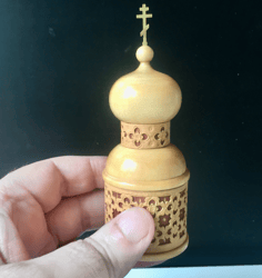 round wooden box in shape of church | with incense from mount athos | brass cross