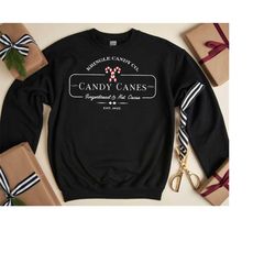 christmas candy cane sweatshirt, christmas shirt, kringle candy co sweater, christmas gifts tee, christmas sweatshirt