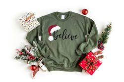 believe christmas shirt, christmas believe sweatshirt, christmas party santa hat shirt christmas t-shirt, christmas fami