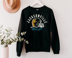 vintage jacksonville football retro helmet est 1995 black sweatshirt , jacksonville football team unisex sweater, americ