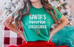 christmas cheerleader shirt, santas favorite t-shirt, cheer shirts for women, 2023 christmas gifts, funny daughter tee,