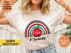 colorful teacher's life t-shirt with rainbow and apple design, bright and cheerful teacher tee with rainbow and apple gr