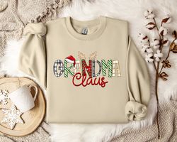 grandma claus sweatshirt - cozy winter apparel - festive grandparent christmas pullover - seasonal holiday fashion - uni