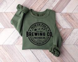 christmas shirts, north pole brewing co sweatshirt, brewing co sweatshirt, north pole sweater, brewing co, premium chris