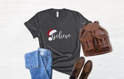 Believe Christmas Shirt, Womens Christmas T-shirt, Christmas Party Shirt, Boyfriend Christmas Gift, Dad Christmas Gift,U