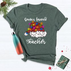 santas favorite teacher shirt, funny teacher christmas shirt, teacher life shirt, christmas t-shirts, holiday xmas shirt