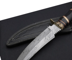 a very beautiful handmade damascus steel hunting bowie knife