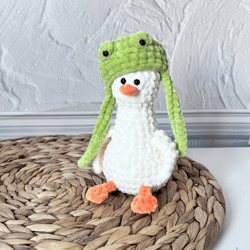 cute goose in a frog hat. duck keychain