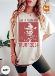 aint my first rodeo trump t-shirt, western donald trump cowboy shirt, maga shirt, funny conservative ultra maga