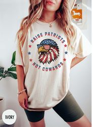 raise patriots not cowards shirt, july 4th trump 2024 shirt, patriotic conservative gifts, pro-america maga trump shirt