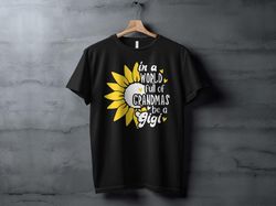 be a gigi sunflower graphic shirt, - in a world full of grandmas, unique gigi t-shirt, floral grandmother gift