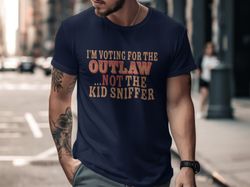 funny political t-shirt, im voting for the outlaw not the kid sniffer, humorous election shirt, sarcastic campaign shirt