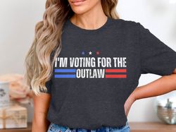 im voting for the outlaw t-shirt, patriotic graphic shirt, election shirt, political statement t-shirt, funny election