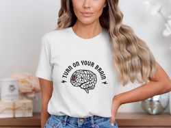 unique graphic shirt, turn on your brain design, trendy t-shirt, cool brain illustration, motivational shirt