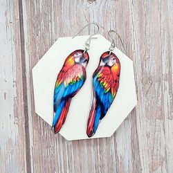 handmade colorful macaw parrot earrings long lightweight tropical bird jewelry in blue and red