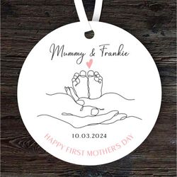baby feet in hands first mothers day gift round personalised ornament