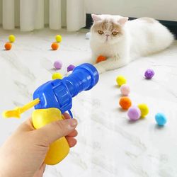 engage your kitten with interactive launch training toys: mini shooting gun games and plush ball stretching fun - pet ac
