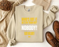 whos got it better than us nobody go blue shirt