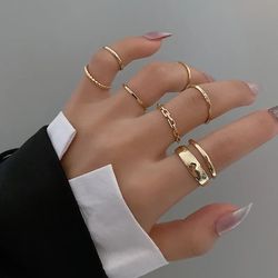 7-Piece LATS Fashion Ring Set: Trendy Metal Hollow Round Rings for Women - Perfect Party & Wedding Gifts