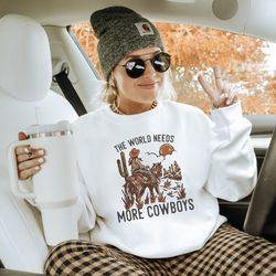 the world needs more cowboys crewneck, oversized western aesthetic sweatshirt, long live cowboy, cowboy killer