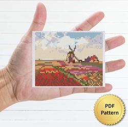 tulip fields in holland by claude monet cross stitch pattern. miniature art, easy tiny