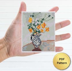 nasturtiums in a blue vase by claude monet cross stitch pattern. miniature art, easy tiny