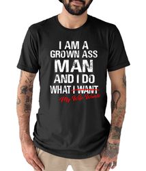 i am a grown man i do what i want if my wife lets me text black t shirt