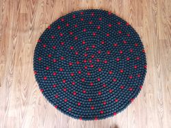 handmade wool felt ball carpet in navy blue - 100 cm diameter