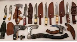 lot of knifes ,pizza cutter | axe folding knife