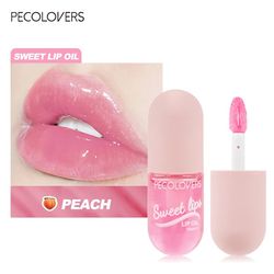 "glossy peach lip gloss: fruity, not sticky, and daily lip oil"