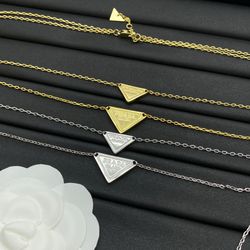 prada necklace triangle - iconic luxury jewelry - prada necklace