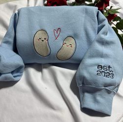 personalised bean embroidered sweatshirt,  cute customisable couple bean with est,  year  embroidered on the cuff of the