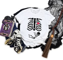 halloween pregnancy skeleton t-shirt, skeleton halloween baby announcement shirt, baby shirt, funny pregnant shirt, new