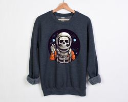 halloween astronaut skeleton sweatshirts, sweatshirt, halloween skeleton sweatshirt, astronaut sweatshirt, halloween spa