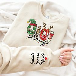 Custom Gigi Claus Sweatshirt and Hoodie, Kids Names on Sleeve Sweatshirt, Grandma Christmas Gift, Custom Grandma Sweatsh